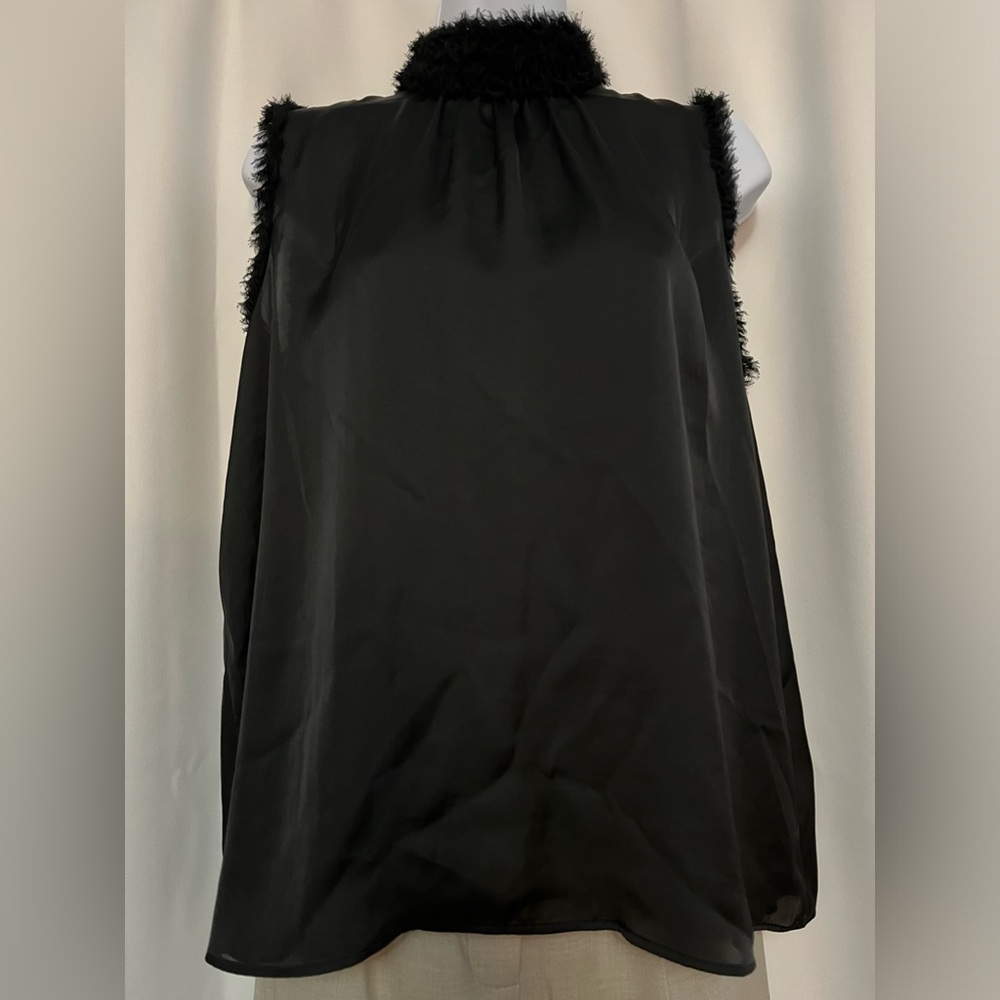 Sleeveless black top by Zara